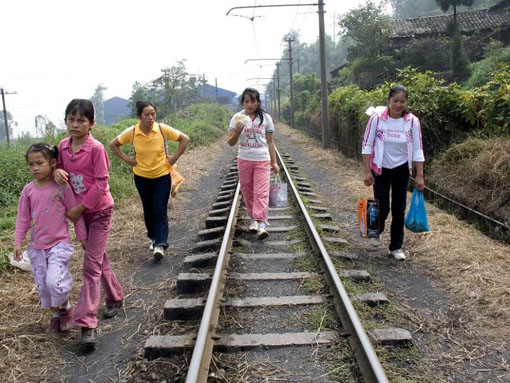 Walking on the Rail C This can save the three Yuan (about 0.4 USD) train ticket. 